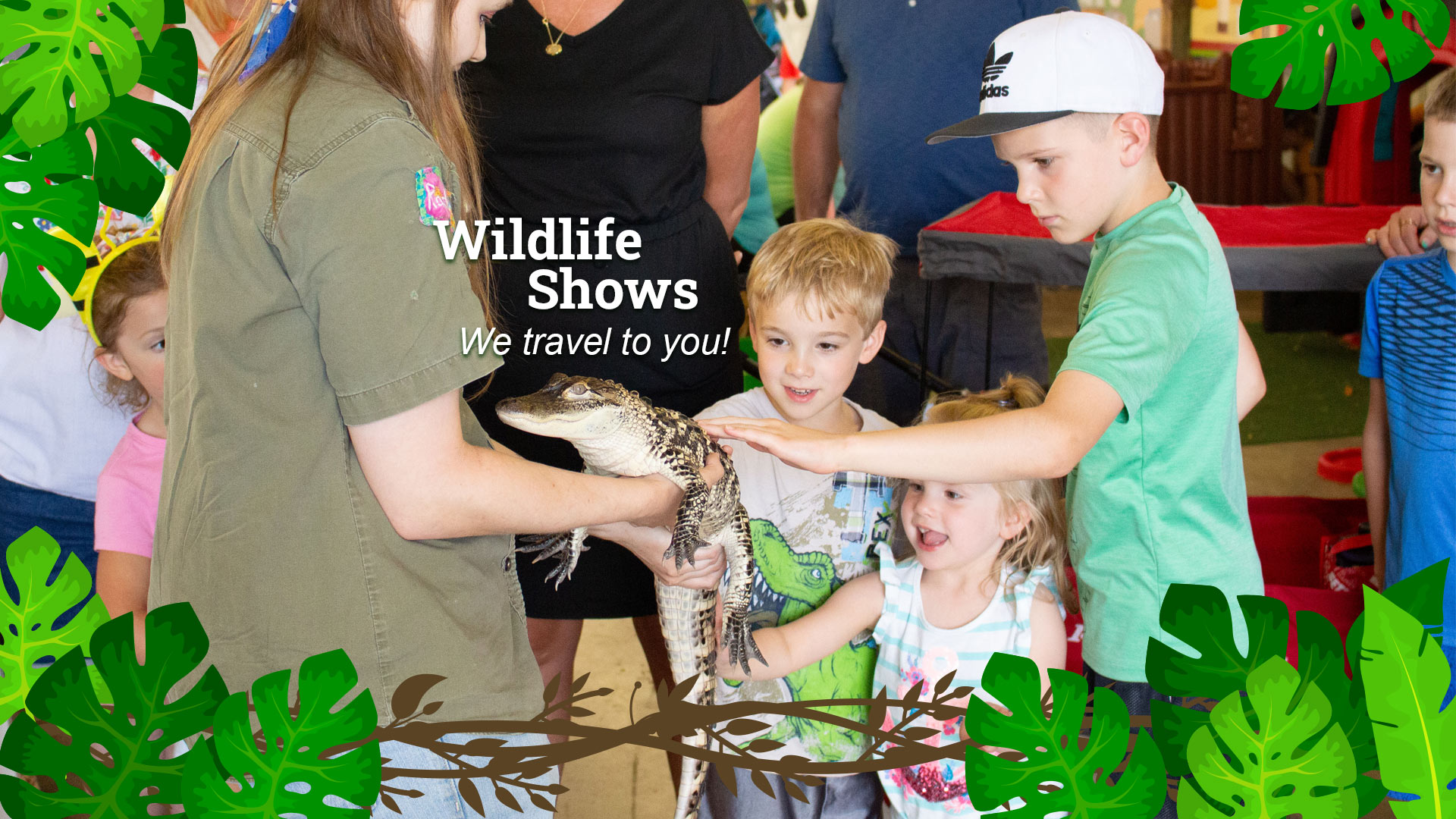 Wildlife Shows at Sustainable Safari We Travel to You! Children petting an alligator with assistance